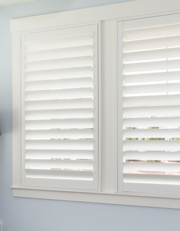 White plantation shutters with hidden tilt rods in Southern California